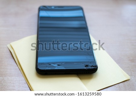 broken smartphone that fell to the ground and need to replace the display