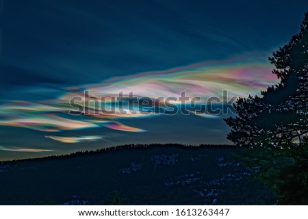 Mother-of-pearl cloud in Norway 260 Royalty-Free Stock Photo #1613263447