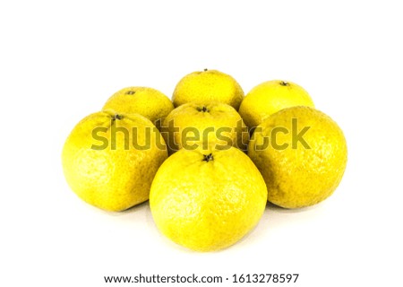 Yellow mandarins or tangerines isolated on white background. Closeup photos of fresh citrus fruit.