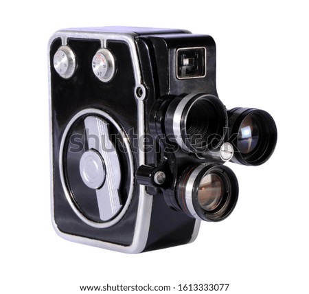 Old movie camera isolated on a white background