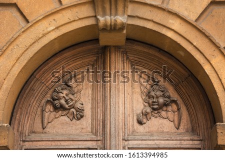 Detail of antique door of an old building in Oxonia.