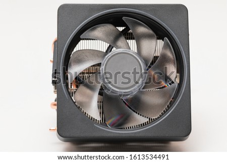 Modern cpu cooler with heat-pipes on white background