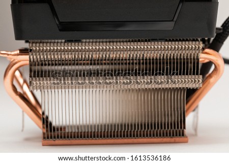 Modern cpu cooler with heat-pipes on white background