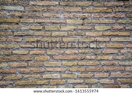 Antique brickwork walls in the castle, close-up. Background. Rome, Italy

