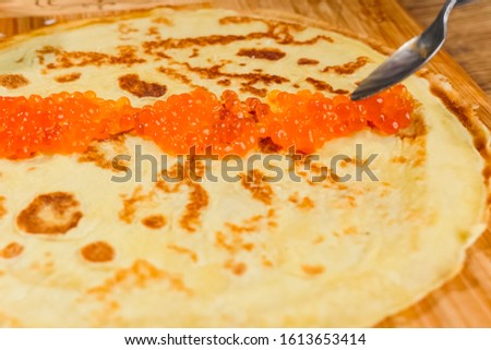 Pancakes with red caviar. red caviar food