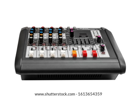 Audio mixer console on white background.