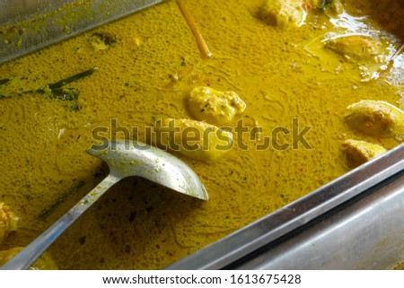A selective focus picture "masak lemak telur itik" at Port Dickson. Traditional dish of coconut based food with spicy chilli.
