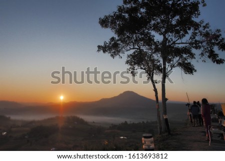 Beautiful mountain view full of mist and fog when the sun rise