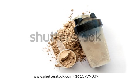 Whey protein powder with shaker for mixing Royalty-Free Stock Photo #1613779009