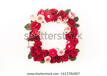 Flat lay frame border with blank copy space mockup made of pink and red rose flowers on white background. Top view floral concept.