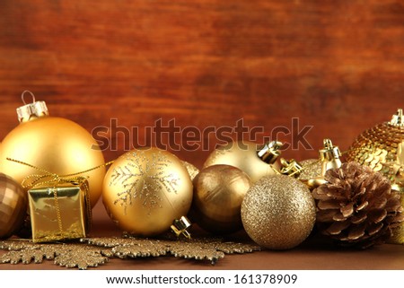 Beautiful Christmas decorations on table on wooden background