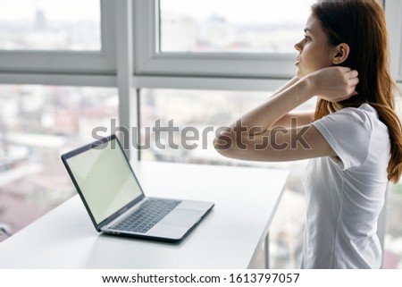 Woman in front of laptop office manager freelancer