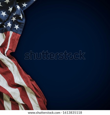 Flag of the United States of America on blue background with copy space