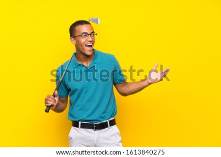 African American golfer player man with surprise facial expression