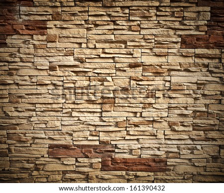 Weathered texture of stained old dark white and gray brick wall background, grungy rusty blocks of brown stone-work technology, colorful horizontal architecture