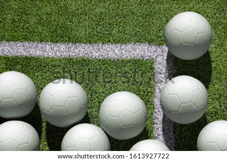 Top view white soccer ball with line on soccer field background.