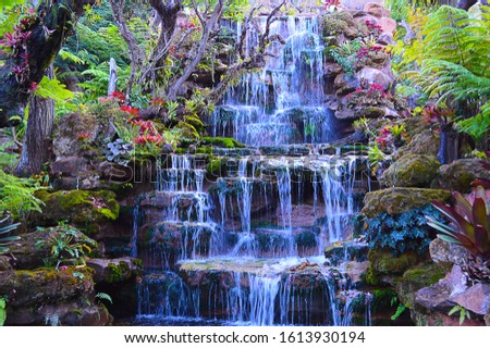 Waterfalls in Thailand. Pictures of waterfalls in a beautiful garden at Wat Pha Phaen. Sakon Nakhon Province, Thailand