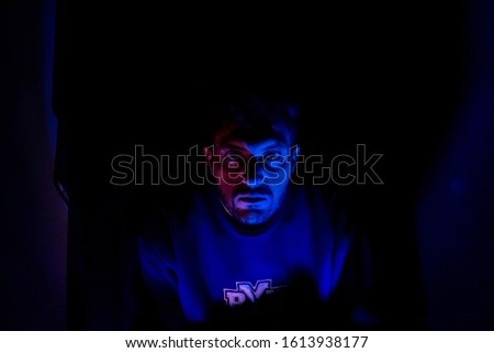 Muslim man with lights reflection on his face