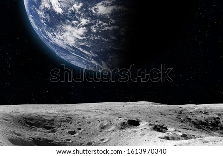 Planet Earth from the moon surface. Elements of this image are furnished by NASA Royalty-Free Stock Photo #1613970340
