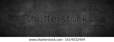 Dark board dust chalkboard background texture in back to school bg for black friday blackground wide white chalk graphic. Grey gradient table top view grunge patterned blackboard. Food bacground.