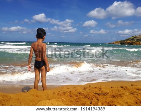 A kid on the beach