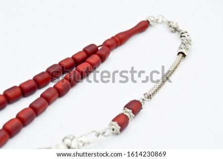 Red and silver beads sequenced, short rosary, tespih tesbih, an important accessory for Turkish culture, isolated on white background
