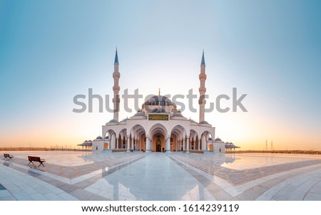 Sharjah New Mosque Famous Tourist attraction In Dubai, Arabic Letter means: Indeed, prayer has been decreed upon the believers a decree of specified times, Sharjah and Dubai Tourism concept Image Royalty-Free Stock Photo #1614239119