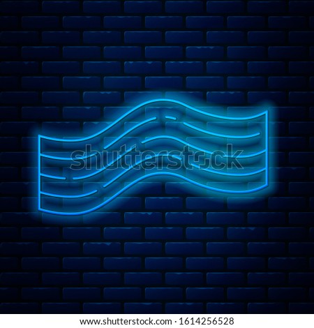 Glowing neon line Bacon stripe icon isolated on brick wall background.  Vector Illustration
