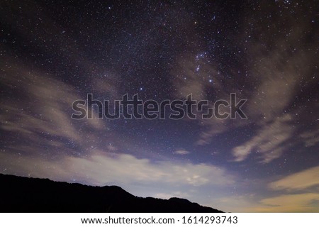 Night Sky Photography in Dehradun Uttarakhand India. Camping under night sky with full of stars on new year eve. Light painting in the snow mountains of Uttarakhand India. Night photography. - Image  