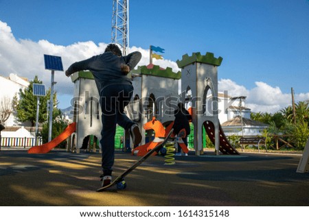 Kid skateboarding in a playground