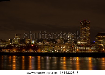 View of Downtown Portland, Oregon, across the Willamette River from the Eastbank Esplanade. 