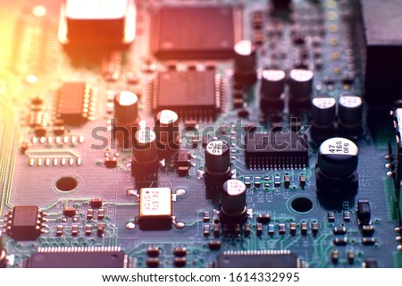 printed circuit Board with chips and radio components electronics Royalty-Free Stock Photo #1614332995