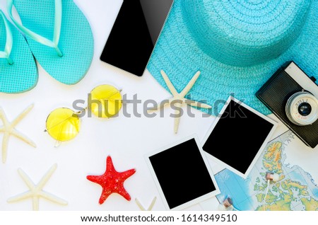 Feminine summer vacation workspace desk mockup. Minimal style beach acsessoaries, camera, blank smartphone screen and place for photos in a square tamplates. Top view