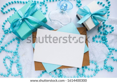 gift box, perfume bottle, lace and envelope