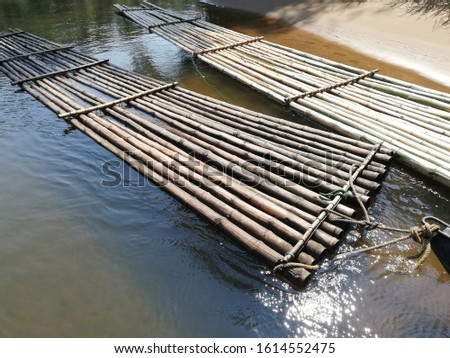 Bamboo raft floating in the river kwai at Sai Yok Yai ,Kanchanaburi,Thailand.