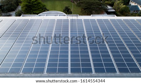 Background of solar panels on building.