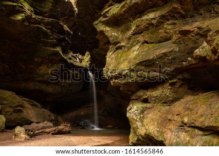 The waterfall at Conkles Hollow flows over rugged cliffs of Blackhand Sandstone in southeast Ohio. 