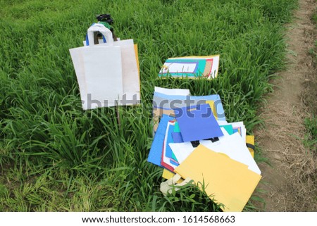 Isolated bags on green. I am not plastic. Campaign to reduce the use of plastic bags. Zero waste. Environment Friendly Concept. Reduce, Reuse, Recycle, save earth. World Environment Day.