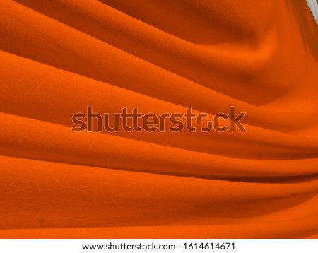 Orange fabric texture and background