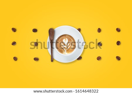 A cup of Latte coffee with scattered roasted coffee beans on yellow background. Monday coffee latte.
