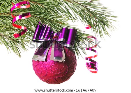 Christmas ball with bow on pine branch; white background