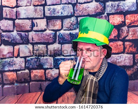 Saint Patrick with a mug of ale. People. Holiday. St.Patrick 's Day. The man. Place for text.