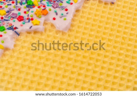 Sweet waffle background with cream. Space for text or design. 
