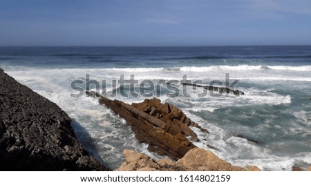 
The rocky Ginshu beach on the west coast of the Atlantic Ocean in Portugal, Santa Cruz.