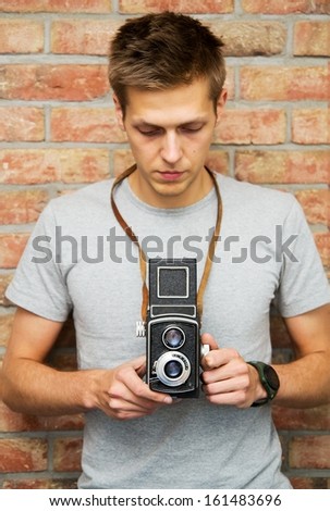 Man with old camera
