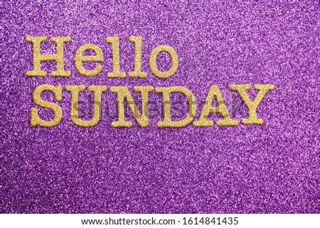 Hello Sunday alphabet letter on purple glitter background