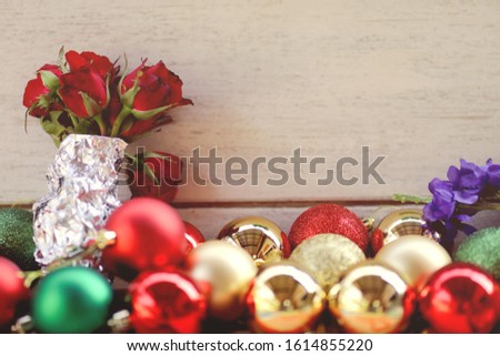 Valentine Decorations in selective focus, picture of colorful balls and bouquet of roses arranged for holidays such as Saint Valentine's Day, New Year, Christmas, and other special occasional events