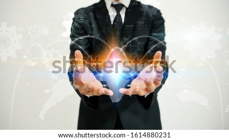 Businessman holding map network. Social network concept                               