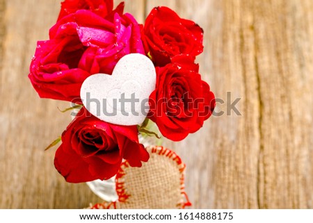 Red rose bunch with little heart shape. Valentine or women day concept