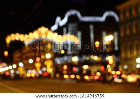 Defocused background of Nevsky Prospect at Saint Petersburg with lights at Christmas holiday